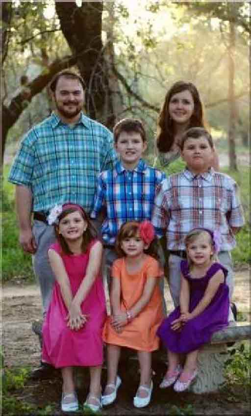 John was wounded in the shooting and Crystal and her unborn child were killed as were their children Emily (front left), Megan (front middle), and Greg (right). Son Phillip (middle) was not in church, and daughter Evelyn (front right) was wounded,